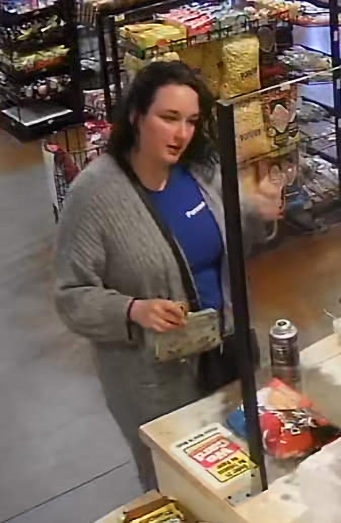 This photo taken from store surveillance video and provided by the Lyon County Sheriff's Office shows Naomi Irion, 18, of Fernley making a purchase shortly before authorities say she disappeared on March 12, 2022.