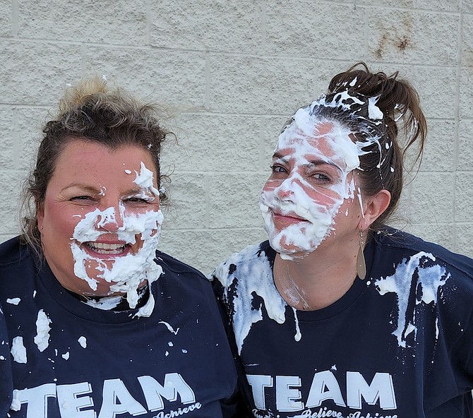 The winning class on Pi Day was able to Pie the Principals, Chief Academic Officer Rochelle Tisdale, left, and CEO Melissa Mackedon.