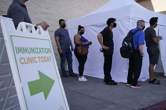 A line for COVID-19 vaccinations at an event at La Bonita market on July 7, 2021 in Las Vegas.