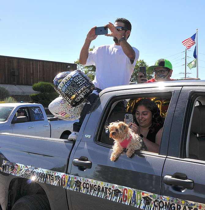 The Parade of Graduates drive-through ceremony at Western Nevada College enables family and friends to get up close to their graduate for pictures and to celebrate this special occasion.