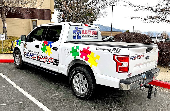 The Douglas County Sheriff’s Office wrapped a vehicle with colored puzzle pieces as an inviting way for children and adults with autism to meet deputies in a casual setting.