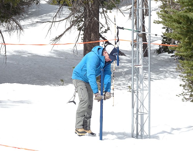 Jeff Anderson, hydrologist for the Natural Resource Conservation Service in Nevada, measured the snowpack on Mount Rose on April 4, 2022.
