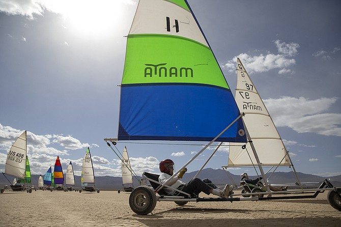 Pilots catch the wind as a Manta twin class race begins during America's Landsailing Cup at Ivanpah Dry Lake on March 20, 2022, near Primm.