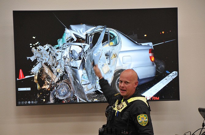 Carson City Sheriff’s Deputy Michael Jerauld emphasizes a point to students about a head-on collision during a driver’s education course at Western Nevada College.