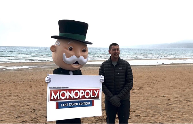 Mr. Monopoly with Top Trumps representative Aaron Green in Kings Beach to announce the special edition of Lake Tahoe Monopoly.