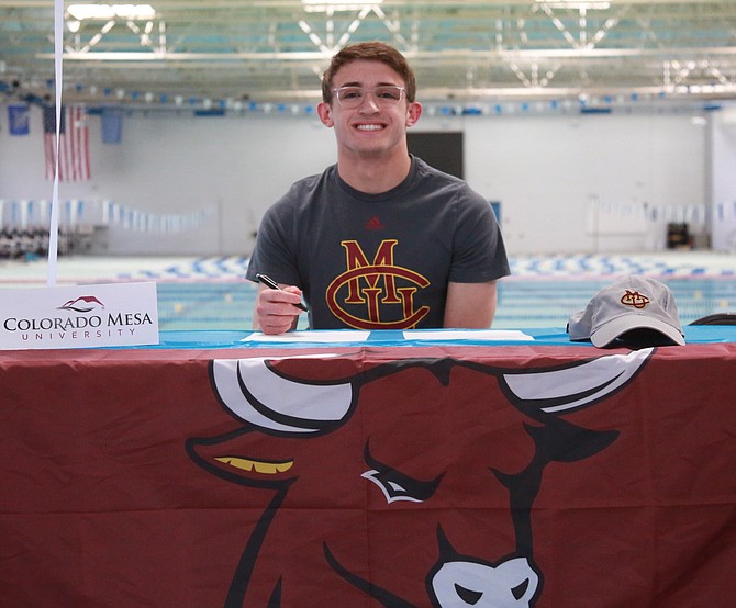 Carson High senior Nicholas Melsheimer smiles after signing his National Letter of Intent on Tuesday with Colorado Mesa University.