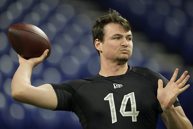 Nevada quarterback Carson Strong throws during a drill at the NFL scouting combine on March 3, 2022, in Indianapolis.