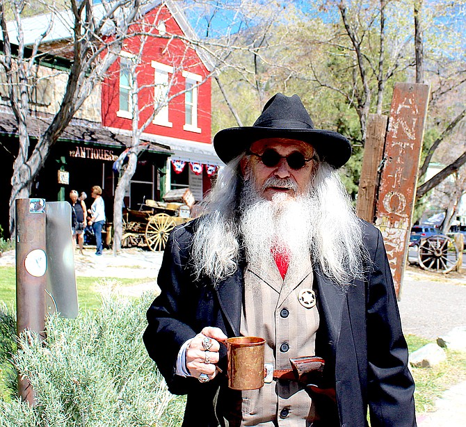 Virginia City's Yukon Steve stops for a chat in front of the Genoa Bar on Saturday morning.