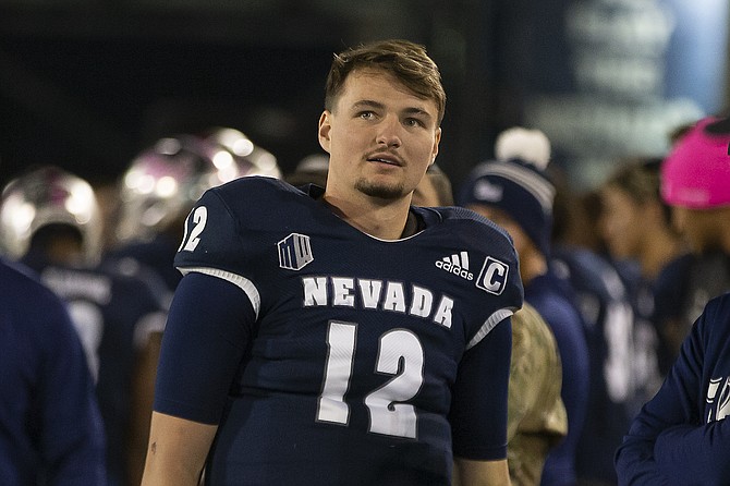 Nevada quarterback Carson Strong on the sideline against New Mexico State in Reno on Oct. 9, 2021.