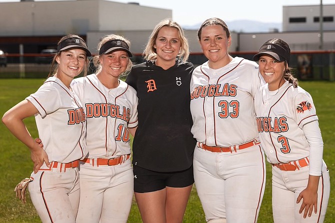 The Douglas High softball seniors pose for a photo during Senior Night Saturday against Carson High. Pictured from left to right are, Emma Stagliano, Emma Glover, Reagan Brown, Ryleigh Blaire and Eva McNinch.