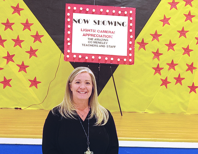 Educational Interpreter Marilyn Weese spun a challenge on the school’s Survivor Wheel during Teacher Appreciation week to contact The Record-Courier.