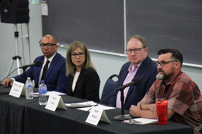 Carson City School Board candidate Jason Stinson, far right, speaks Tuesday at the Carson City Chamber of Commerce Primary Candidates Forum as candidates Albert Jacquez, far left, incumbent Lupe Ramirez and Adam Heinz listen.