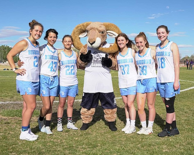 Oasis Academy girls lacrosse seniors Maiya Swan, Angel Arteaga, Bella Leal, Lauren Halloran, Shealyn Snodgrass and Kailyn Sorensen were recognized with the school’s mascot, Buster the Bighorn, before the final game of their career.