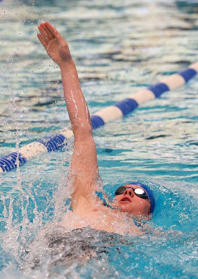 Carson High swimmer, Todd Gosselin, comnpetes int he 200-yard individual medley at the Class 5A regional swim meet in Carson Friday. Gosselin, swimming the backstroke, was fifth in the event.