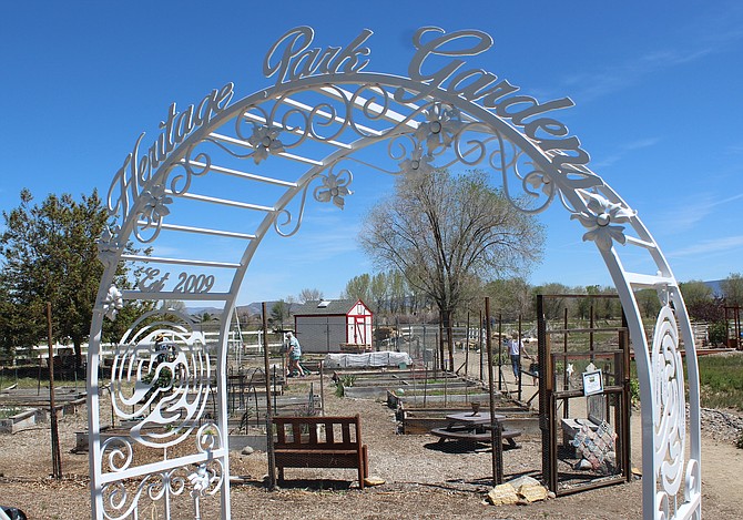The gate to the Heritage Park Gardens on Monday morning.