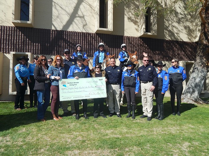 The Douglas County Sheriff's Mounted Posse received a $7,500 donation from the Northern Nevada Giving Tree.