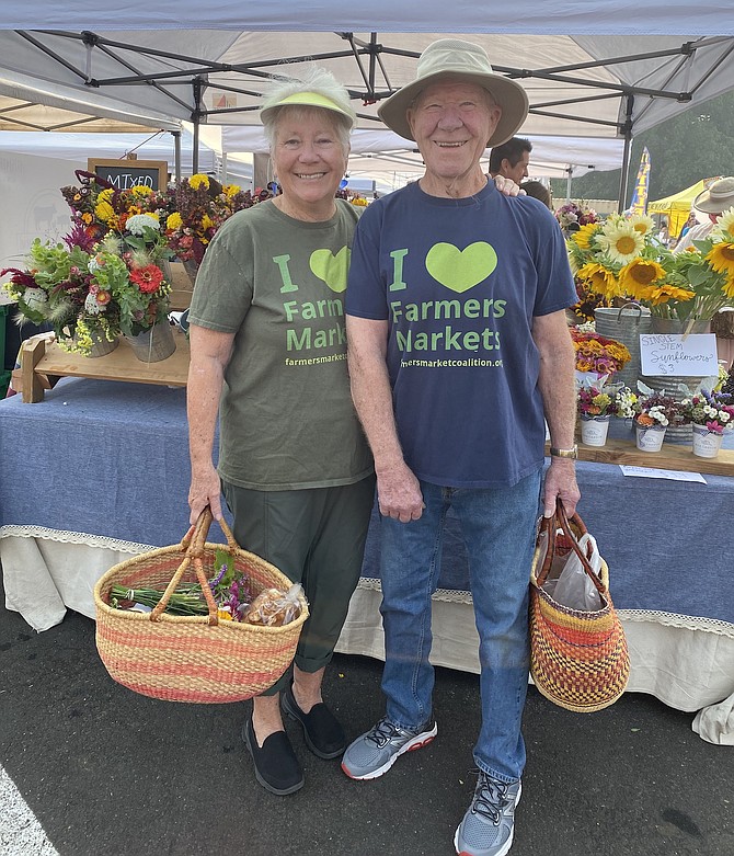 Ralph and Linda Marrone pick up their produce at the Carson City Farmers Market.