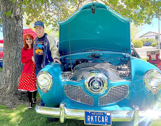 Sam Bailey and his wife next to their 1951 Studebaker Champion Business Coupe.