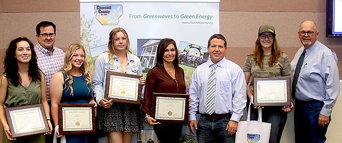 Five local students from Churchill County received Jim Regan Memorial Scholarships at the May 18 meeting of the Churchill County commissioners. From left are Kyla Trotter, Commissioner Greg Koenig, Kaitlyn Hert, Tayler Felton, Wendy Bullock, Commissioner Justin Heath, Gabriana Loop and Commissioner Pete Olsen.