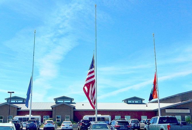 The flags are at half-staff at the Douglas County Community & Senior Center in memory of the Texas school children who were murdered on Tuesday. Remember to tell the people close to you that you love them, not just today, but every day.