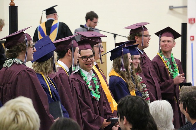 Members of Sierra Lutheran High School’s Class of 2022 stood before their families after accepting their diplomas Saturday.