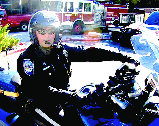 A photo of Trooper Dan Lopez on his motorcycle.