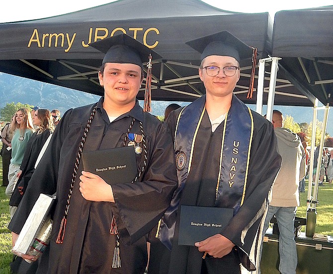 Douglas High School graduates Erik Harsh and Clay Newmyer were in JROTC together throughout their high school career. Newmyer said he has been accepted into the Navy and leaves June 29.