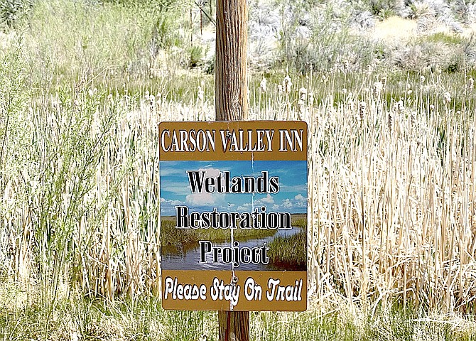 A sign asks Martin Slough Trail users to stay out of the wetlands behind the Carson Valley Inn in Minden. Robin Sarantos Photo