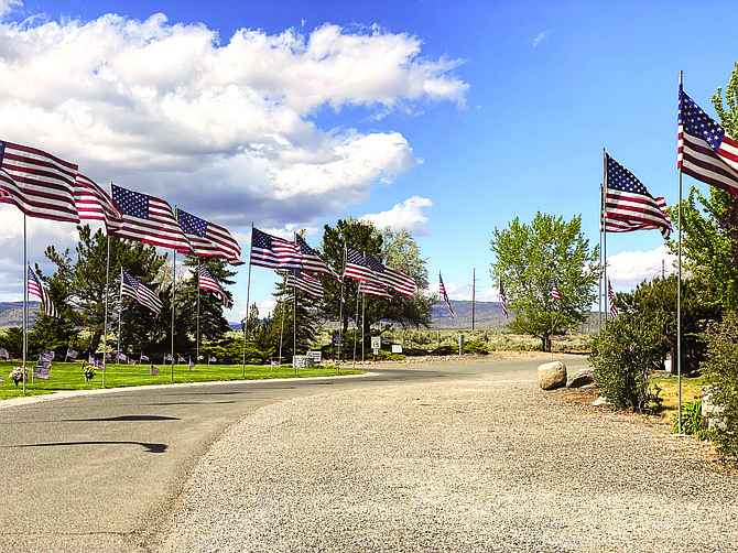 Large flags fly at Eastside Memorial Park in Minden on Memorial Day. In addition to being Election Day, Tuesday is also Flag Day and the U.S. Army’s 247th birthday.