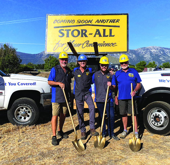 Robert, Todd, Max and Tom Whear pose with shovels at the June 1 groundbreaking for Stor-All’s expansion.