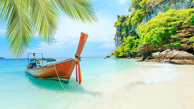 Spend Valentine’s Day 2023 walking the world-class white sugar sand beaches of Thailand’s island of Phuket, the last stop on a 14-day trip to Thailand.