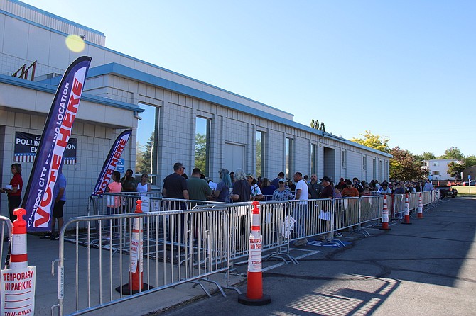 Voters line up to cast primary election ballots at the Carson City Community Center on June 14, 2022.