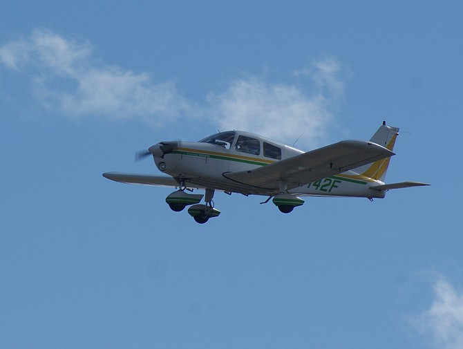 A Cherokee Cruiser makes its final approach toward the Carson City Airport runway.