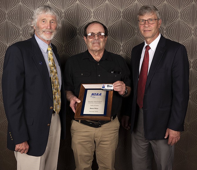Retired Record-Courier Sports Editor Dave Price, center, was inducted into the Nevada Interscholastic Athletic Association’s Hall of Fame on June 10. With him are Jerry Hughes, left, retired NIAA executive director, and Bart Thompson, right, current executive director.