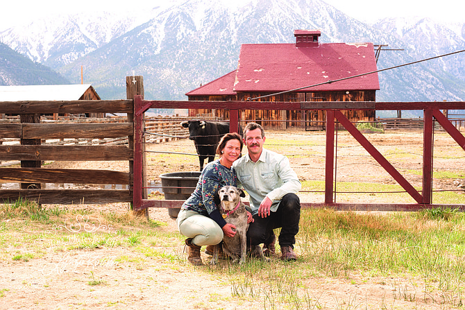 Theresa Orrock, dog Lola, and Tyrel Dressler before their big wedding day on the Dressler Ranch.
