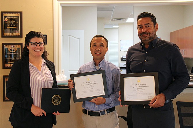 On behalf of U.S. Sen. Jacky Rosen’s office, Molly Lewis awarded Dr. Matti Vazeen and Dr. William Wu certificates of recognition.