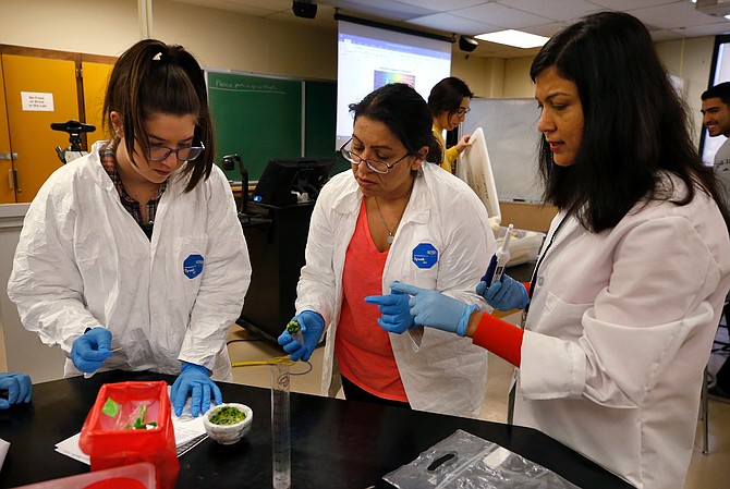 Bailey Pendergrass and Shaoyan Dossey practice their skills during a Western Nevada College Certified Nursing Assistant class on the Fallon campus.