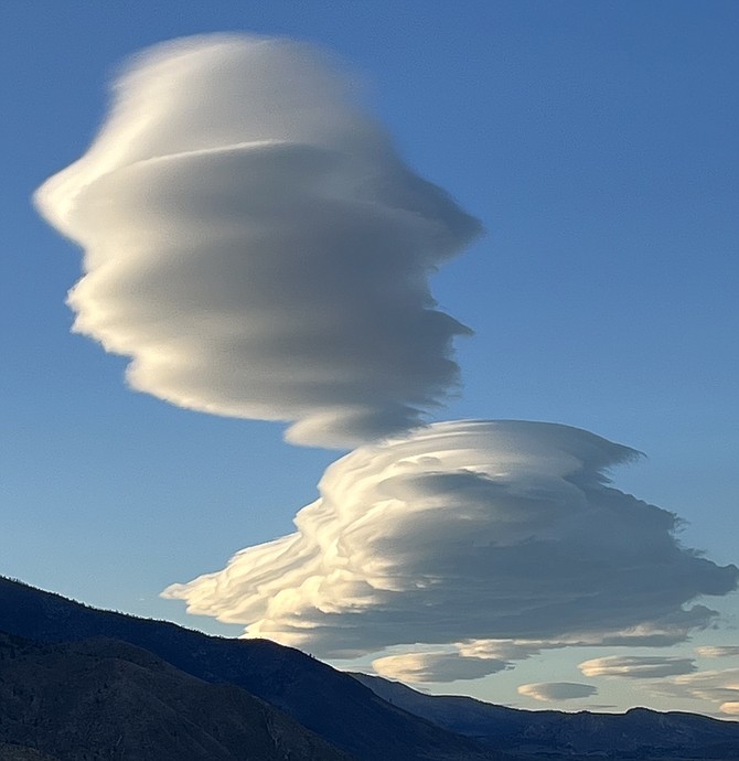 Lenticular clouds cruise over Carson Valley on Sunday in this photo by Michael Smith.