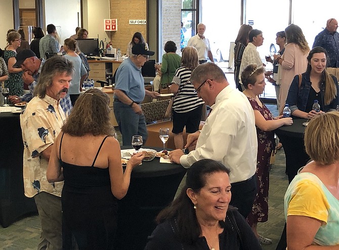 A crowd enjoys the 2019 Books, Bites & Beverages event.