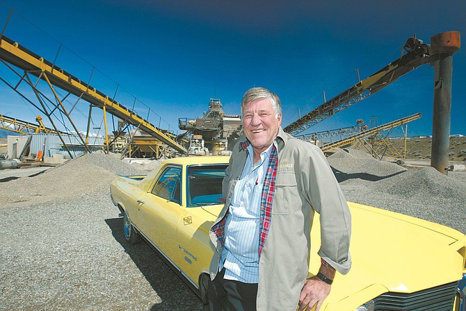 Gerry Bing poses with his yellow El Camino at the Bing Pit in the Gardnerville Ranchos. He was named small business champion by the Nevada chapter of the National Federation of Independent Business in April 2005.