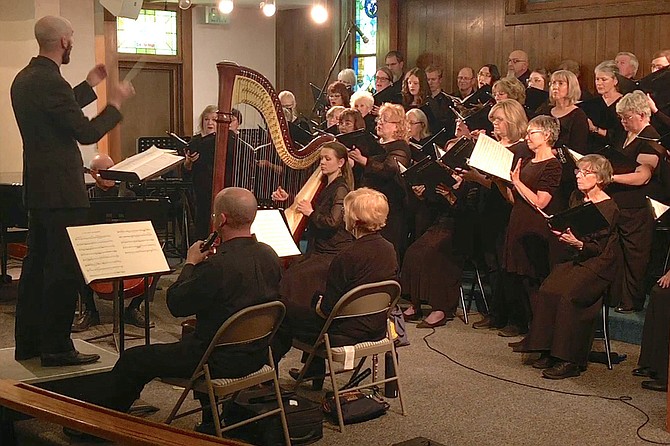 Ricky Hutton directs Carson Chamber Singers in concert at First United Methodist Church in Carson City in May 2022.
