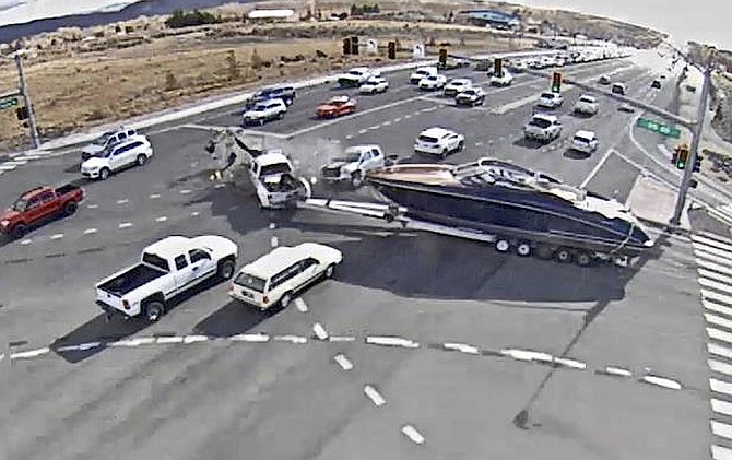 Traffic camera footage of a 37,000 pound yacht plowing through the intersection of Highway 50 and Carson Street on Nov. 9.