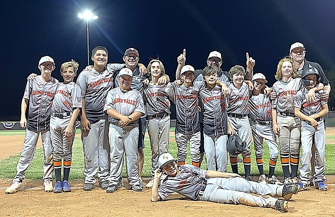 Carson Valley Little League 12U team after winning against Mountain Ridge to secure their spot in the State Championship.