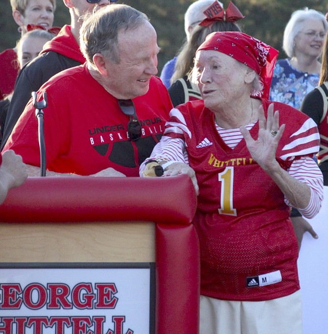 Whittell Athletic Director Phil Bryant chats with Angel of Tahoe Lisa Maloff during a 2018 dedication in recognition of her donation to construction of the field.