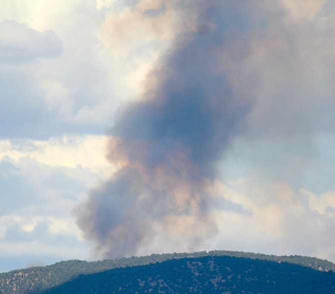 Smoke rises over the Pine Nuts from the Lebo Fire estimated at five acres burning in sage and piñon juniper.