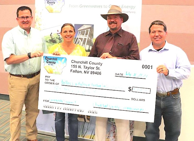 At their last meeting, the Churchill County commissioners approved $10,000 for the Fallon Cantaloupe Festival. From left are Commissioner Greg Koenig, Fallon Cantaloupe Festival & Country Fair representatives Adrienne Snow and Zip Upham and Commissioner Justin Heath. The Fallon Cantaloupe Festival & Country Fair will be held Aug. 26-28 at the 3C Event Complex at the fairgrounds. Musical concerts (on Friday and Saturday nights) and the cutest cowboy/cowgirl contest (Sunday) will be in the Rafter 3C Arena.