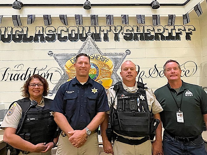 Sgt. Bernadette Smith, Sheriff Dan Coverley, Deputy Todd McEwen, and State of Nevada Clinician David Kale of the Mobile Outreach Safety Team.