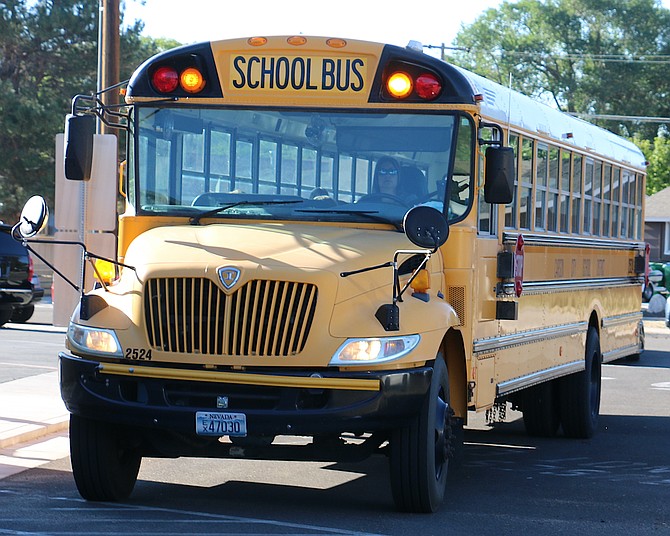 A Carson City School District bus driver brings in students to Fritsch Elementary School on the first day of school Aug. 15, 2022.