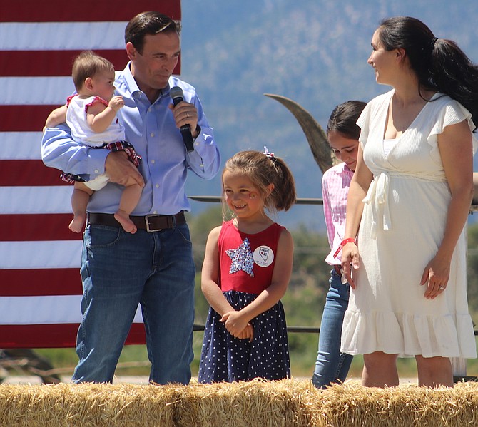 Adam Laxalt brings his family on stage Aug. 13, 2022 before he spoke at the Basque Fry in Gardnerville.