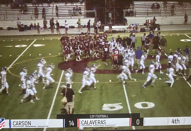 Carson High football celebrates after defeating Calaveras, 14-0, Friday night on the road.
